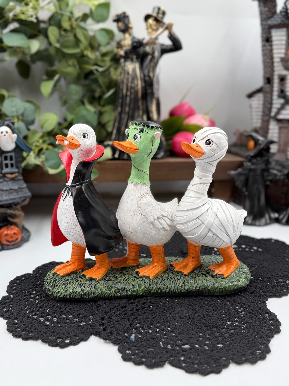 viral halloween costume duck trio figurine vampire frankenstein mummy